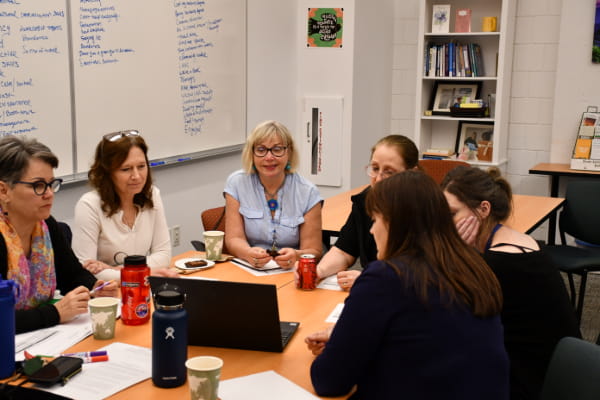 BCC staff in a meeting
