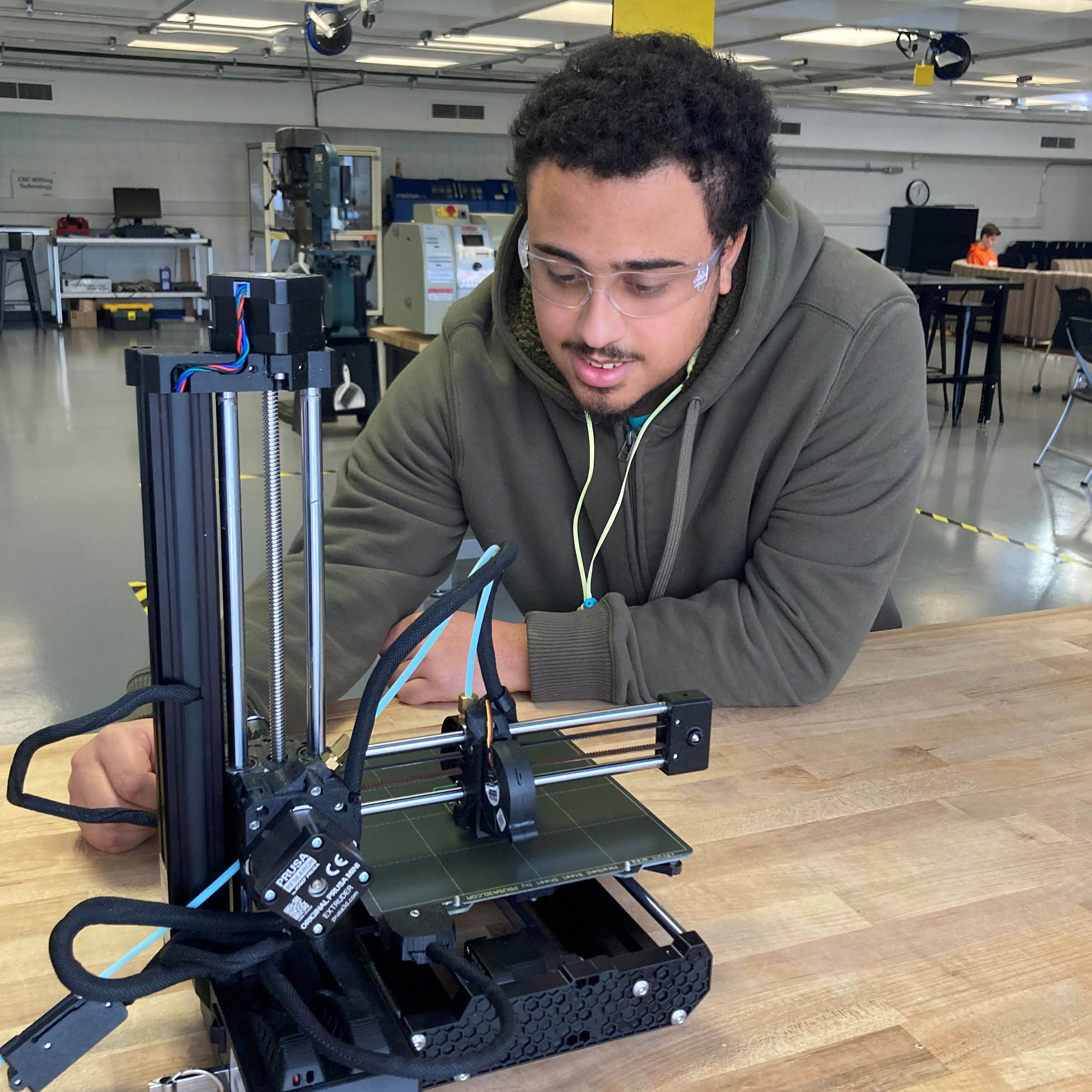 Student with 3D printer 