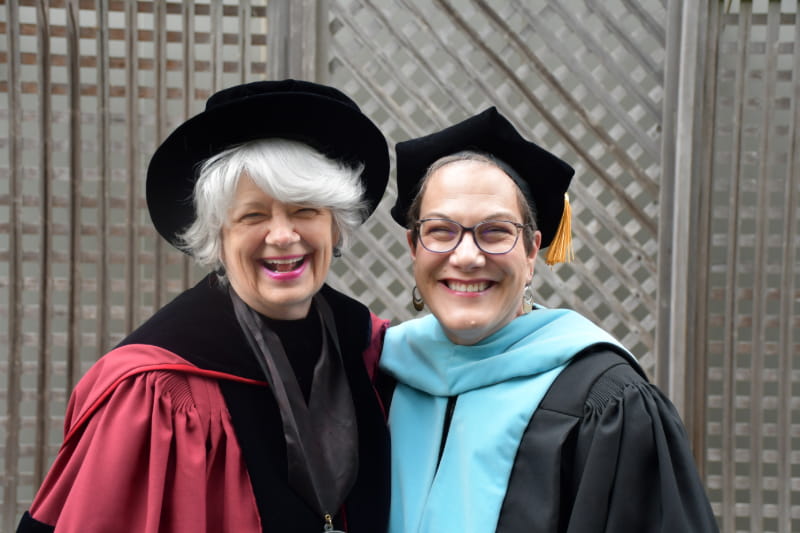 Ellen Kennedy and Hara Charlier at commencement