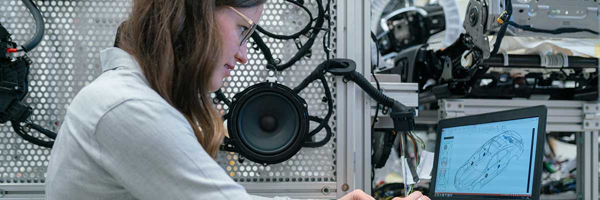 Student working on a computer during a Mechatronics class